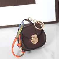 Porte-monnaie multifonctionnel en cuir PU tendance, mini sacoche en forme de selle, porte-clés