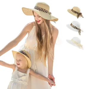 Vente en gros Chapeaux de soleil surdimensionnés Panama léopard avec nœud papillon pour la plage Chapeau de paille d'été pour maman et moi pour enfants