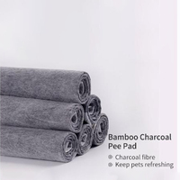 Coussinets d'entraînement pour animaux de compagnie OEM/ODM acceptés, tissu non tissé résistant, absorption instantanée, coussinets de toilette pour chiens