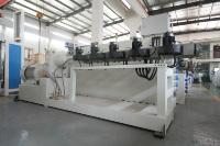 Ligne de production de tubes en PVC pour câbles de télécommunication, grande capacité, production en série, fonctionnement stable, quatre cavités, plastique dur