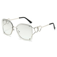 Lunettes de soleil de luxe pour femmes, monture métallique sans cadre, style Y2K2025, dégradé, lunettes en forme de cœur chromées