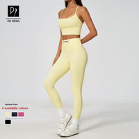 Ensemble de sport uni nude de haute qualité pour femme, comprenant un débardeur de sport à col halter et dos en I, et un pantalon taille haute push-up. Ensembles de yoga.