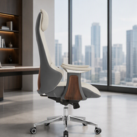 Chaise de bureau ergonomique en cuir de qualité supérieure, dossier haut, pivotante, réglable, avec structure en chrome poli et support lombaire renforcé en acier