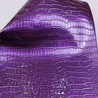 Tissu en cuir artificiel en PVC de crocodile doux et brillant de 0.7mm d'épaisseur pour emballage décoratif de tapis de sac à main de sac de siège de voiture