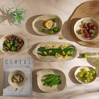 Assiette de style japonais en céramique fabriquée à la main Vaisselle de fête non toxique Bol de riz au design de poisson rustique vintage