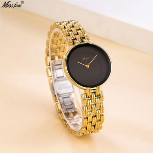 La montre à quartz de luxe pour femmes la plus vendue, élégante, simple, avec cadran noir et doré, étanche - Product Image 1