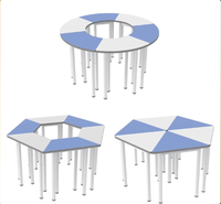 Ensemble de mobilier scolaire en métal pour enfants, idéal pour la peinture artistique, la pratique de l'écriture et l'éducation précoce, adapté aux salles ouvertes, avec chaise et bureau trapézoïdaux