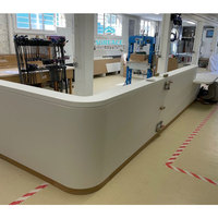 Comptoir de caisse moderne personnalisable avec finition mate, table de réception en pierre artificielle, surface solide