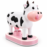 Manège pour enfants en forme de vache mignonne avec couronne de château et base lumineuse LED, équipement d'amusement animalier de dessin animé pour aire de jeux intérieure, centre commercial et parc à thème