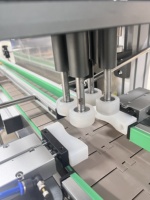 Remplissage et capsulage à 4 têtes à grande vitesse Machine de remplissage d'embouteillage d'eau de jus intégrée Liquide Autres machines d'emballage