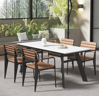 Mobilier moderne d'extérieur en métal imperméable à l'eau haute température Table ronde Ensemble de chaises pour jardin, terrasse, parc, salle pour villas