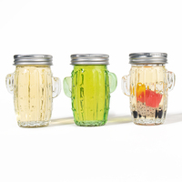 Vente en gros de bouteilles de boisson aux fruits d'orange de 100 ml, bouteille d'eau créative en forme de cactus, bocal en verre avec poignée et couvercle avec paille