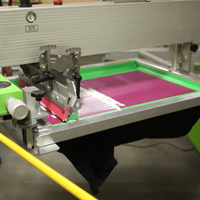 Machine de sérigraphie automatique avec découpe intégrée pour T-shirts