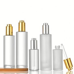 Skin Care 10ml 20ml 30ml 50ml <b>Press</b> Pump Gold Cap Essential Oil Bottles Flat Shoulder Push <b>Button</b> Serum Dropper Bottle - Product Image 6