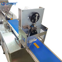 Gedroogde Manggo Chocoladerepen Gebak Dadelcake Fruitrepen Automatische Verpakkingsmachine Met Extruder En Snijder