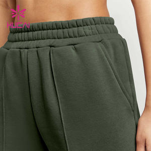 HUCAI OEM ODM Nylon Spandex Alto soporte Color liso Etiqueta personalizada Slim Fit Entrenamiento Fitness Pantalones de chándal para mujeres - Product Image 3