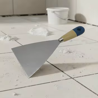 Couteau à mastic en acier au carbone poli miroir avec manche en bois bicolore pour grossistes