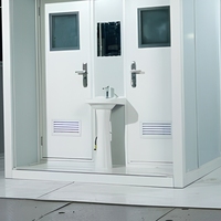 Cabine de toilettes extérieure à double poste avec lavabo intégré et portes d'entrée en acier