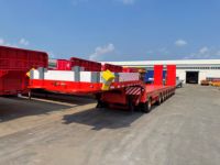 Горячая распродажа: Низкорамный полуприцеп 13000*3000*1650 мм, 1100R20, 12 шт. для перевозки тяжелой техники, например, погрузчиков или экскаваторов