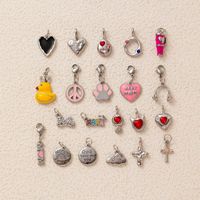 Breloques mignonnes en acier inoxydable imperméables et inaltérables, motifs canard jaune, patte de chat, croix, écouteurs, pour la fabrication de bijoux