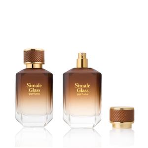 Botella de Perfume de Vidrio Ámbar Degradado de 100 ml con Tapa Texturizada y Caja de Regalo Magnética Negra Personalizada para Marca Privada - Product Image 3