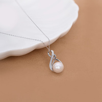 Pendentif et boucles d'oreilles en forme de nœud infini en perles d'eau douce naturelles authentiques de 10-11 mm, ensemble de 2 pièces en argent massif 925