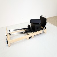 Vente en gros de Reformers Pilates pliables en bois écologique pour l'entraînement à domicile, machine de Pilates pliable commerciale