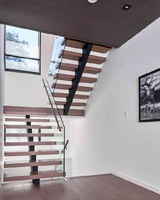 Foshan Factory Custom ized Moderne gerade Treppen aus Stahl und Holz mit Glas geländer Langlebige Montage für Wohnungen