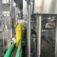 Machine automatique de capsulage de bouteilles de détergent pour capsuleuse d'applicateur de vissage de bouchon à vis