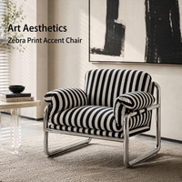 Fauteuil individuel en velours, durable, avec structure métallique et rembourrage en mousse, idéal pour hôtels et salons, design minimaliste.