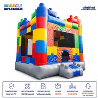Château gonflable en blocs de construction avec petite toboggan, château en briques coloré pour enfants, idéal pour les fêtes d'anniversaire