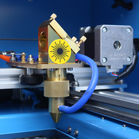 Machine de découpe et de gravure au laser CO2 400*600mm pour matériaux non métalliques comme le bois, la pierre, le bambou, le caoutchouc, l'acrylique et le verre organique 50W 60w 80w 100w