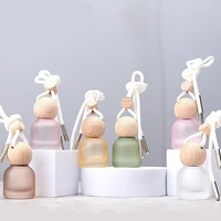 Diffuseur de parfum suspendu de nouvelle couleur 10 ml, pendentif de voiture, parfum, bouchon rond en bois, flacon en verre pour voiture, maison, bureau, désodorisant d'air