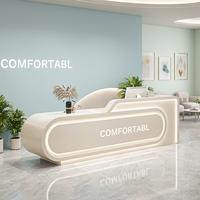 Comptoirs de caisse et de réception en forme d'arc simples pour salons de beauté, magasins de vêtements, établissements de formation artistique, cliniques dentaires