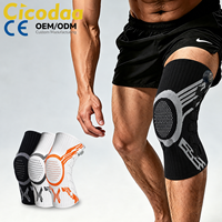 Genouillère de protection à compression tricotée avec bouton de réglage, fermeture magnétique souple et absorption des chocs pour le sport