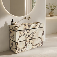 Meuble-lavabo moderne en marbre Calacatta Viola Cammy Stone avec tiroirs, installation sur piédestal, finition polie, personnalisable pour salle de bain