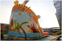 Aire de jeux aquatique gonflable sur le thème de l'océan pour enfants, grand parc de saut gonflable à thème de dessin animé avec toboggan pour événements en plein air