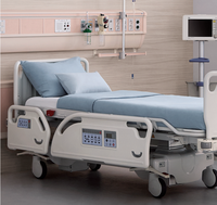 Lit d'hôpital électrique certifié avec poteaux pour perfusion et tiroirs, lit médical multifonction