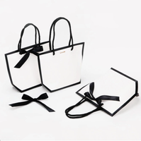 Sac en papier carton blanc avec ruban noir Boîtes d'emballage Shopping Sac à main Boîte à lunch Conteneur alimentaire Bowknot Cadeaux Sacs