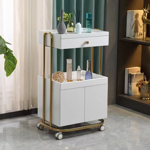 Chariot de travail de luxe pour salon de coiffure en acier inoxydable doré avec armoire de rangement - Product Image 1