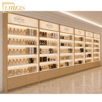 Design d'intérieur de boutique de parfums de luxe sur mesure, mobilier de parfumerie brun foncé, vitrine de présentation de cosmétiques pour parfums