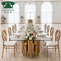 Table de banquet de mariage en acier inoxydable doré avec base au design unique en forme de tuyau, plateau rectangulaire en verre trempé – Derniers modèles de tables à manger