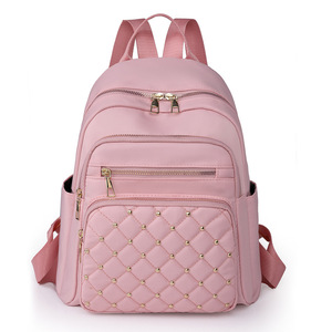 Mochila minimalista de lunares de Color sólido a la moda europea y americana de gran capacidad para mujer, mochila con remaches de diamantes, 2024 - Product Image 6