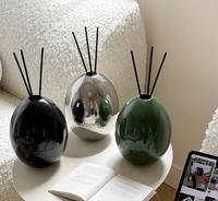 Diffuseur d'arômes en céramique de luxe haut de gamme en forme d'œuf avec parfum de niche et technologie sans feu pour la chambre à coucher, la salle de bain, purificateur d'air