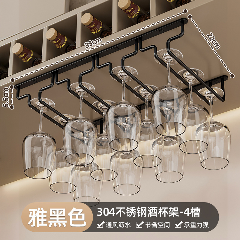 Four slots, 33cm long and 22cm wide, stainless steel, black.