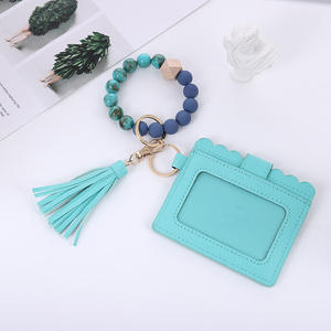 Vente chaude Silicone Voiture Portefeuille Perlé Bracelet Titulaire De La Carte Femmes Filles Bracelet En Cuir PU Gland <span class=keywords><strong>Porte</strong></span>-clés - Product Image 4