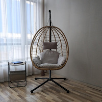Fauteuil suspendu en rotin moderne facile à plier avec coussin et structure métallique pour la salle de sport, l'hôtel, le parc et l'hôpital