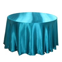Nappe ronde moderne et élégante en satin polyester anti-poussière de couleur unie pour la décoration d'hôtels, mariages et dîners