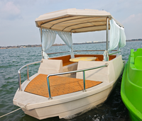 Nouveauté : Bateau électrique de loisirs pour l'extérieur avec auvent et table, idéal pour les fêtes aquatiques et les rassemblements familiaux sur le lac