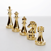 Jeu d'échecs de luxe noir et or, pièces métalliques, plateau pliable à motif marbré, personnalisable OEM, vente en gros